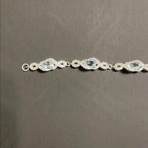 Elegant Silver Sky Blue Topaz and Diamond Gemstone Bracelet